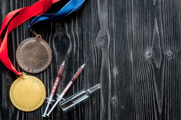 Concept of doping in sport - deprivation medals top view