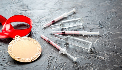 Concept of doping in sport - deprivation medals