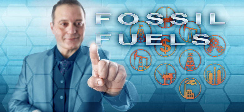 Smiling Male Industrialist Touching FOSSIL FUELS