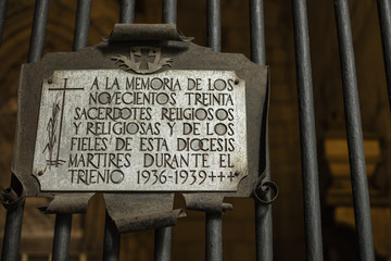 Detail of commemorative plaque in memory of priests, monks and related religious people killed...