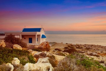Cyprus, Mediterranean Sea coast. Agioi Anargyroi church at Cape Greco at sunrise