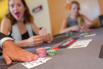 Fototapeta premium Adults around casino table