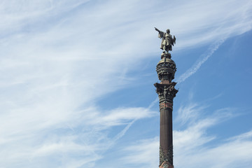 Detail of statue of Christopher Columbus pointing to America in Barcelona, Spain