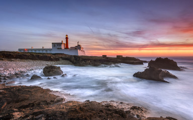 Fototapeta na wymiar Sunset at Isolated Lighthouse