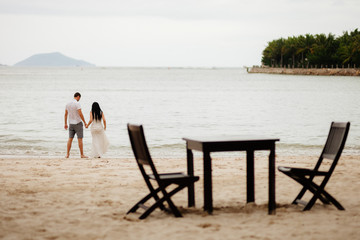 honeymoon couple relax on beach