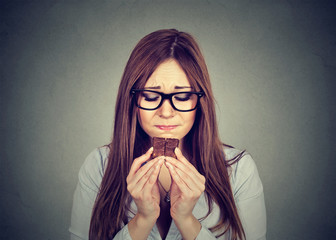 sad woman tired of diet restrictions craving sweets chocolate