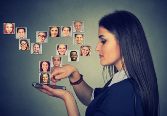 woman using smart phone has many contacts in mobile phonebook