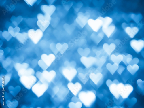 &quot;Blue heart bokeh Christmas light holiday background.&quot; photo libre de
