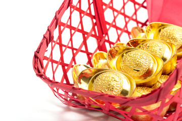 Chinese new year festival decorations, ang pow or red packet and gold ingots.