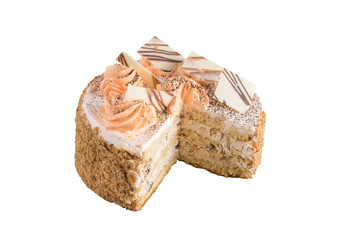 cake with white chocolate pieces on top isolated on white
