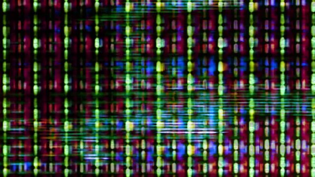 TV screen pixels fluctuate with color and video motion (Loop).