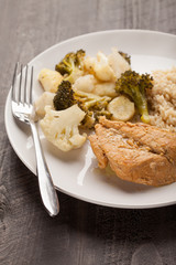 Lemon Lime Chicken with brown rice and roasted vegetables vertical shot
