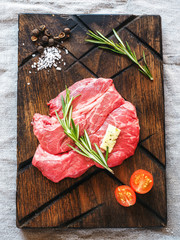 Fresh Beef steak on a wood cutting board