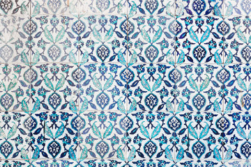 Seamless pattern white Turkish tiles with blue ornaments. Old su