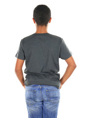 Young African American boy in blank gray t-shirt standing on white background