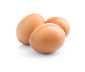 Brown eggs isolated on white