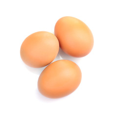 Brown eggs isolated on white