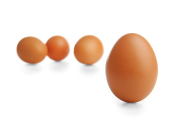 Brown eggs isolated on white