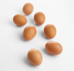 Brown eggs isolated on white