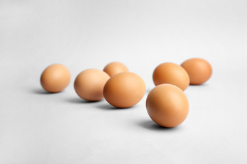Group of eggs on light background