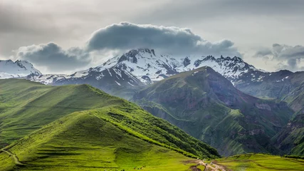 Tuinposter Snowy peak of Kazbek mountain in Kazbegi, Stepantsminda, Georgia © k_samurkas