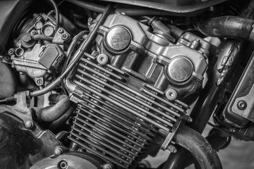 Detail of motorcycle engine for design. Black and white. Dark edged.