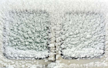 Car window in snow.