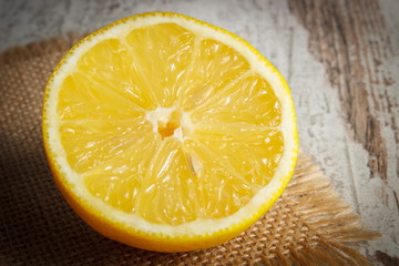 Fresh lemon on old white wooden table, healthy food and nutrition
