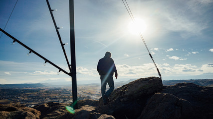 The Man Hiking on the Mountain