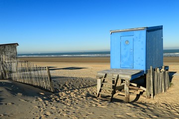 Fototapeta na wymiar CABINS ON THE BEACH OF CALAIS IN WINTER , PAS DE CALAIS, FRANCE 