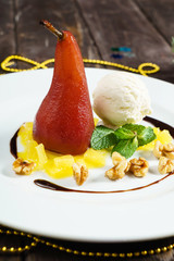 Poached pear in red wine and cinnamon