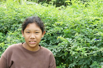 Girl smiling in the garden