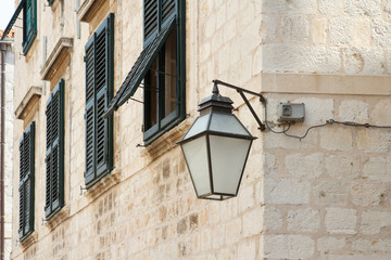 Beautiful lantern on the wall of the house in the old town of Dubrovnik.