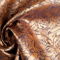Fabric silk texture. Rose flowers, gold color