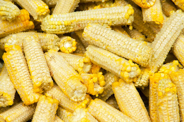 Pile of corn cob kernels out.