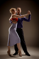 The man and the woman dancing argentinian tango - obrazy, fototapety, plakaty