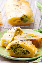Strudel  with broccoli and scamorza .selective focus.