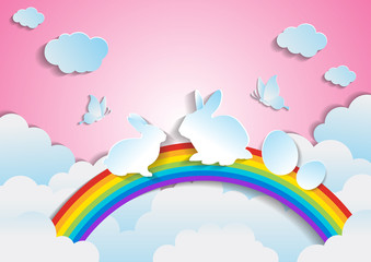 Easter with rainbow and sky.paper art style.