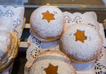 Obraz na płótnie Canvas Fresh tasty donuts for Hanukkah celebration
