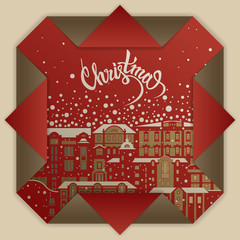 Concept for luxury holiday card. Lettering "Christmas" on red paper with winter city pattern. Origami square, folded corners.