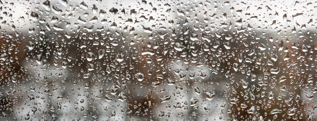 Image of rain drops on glass closeup