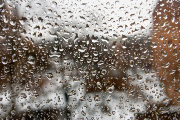 Image of rain drops on glass close-up.