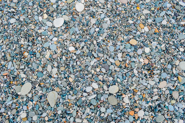 Colorful pebbles close up view on the beach in Batumi, Adjara, Georgia