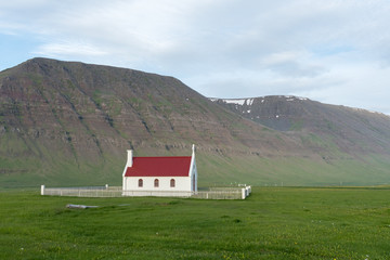 Alone Red and White church in iceland