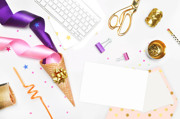 Glamour style background, flat lay. Gold and party items: Cocktail tubes apple, pear, spiral, ice cream cone, gold cosmetic bag, golden pineapple, stapler, scissors, paste. Desktop. view table, up.