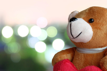 Close up teddy bear on nature bokeh background