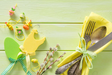 Easter table setting on wood background