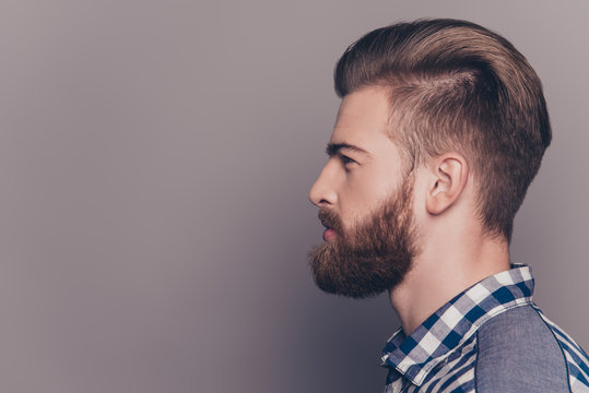 Side view portrait of handsome thinking stylish young man lookin