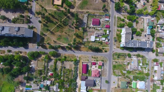 Aerial view of the road and houses in the Berdyansk city, Ukraine. 4K, Ultra HD video.