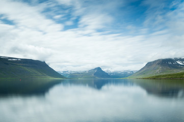 Fjord Mountains reflect in the lake